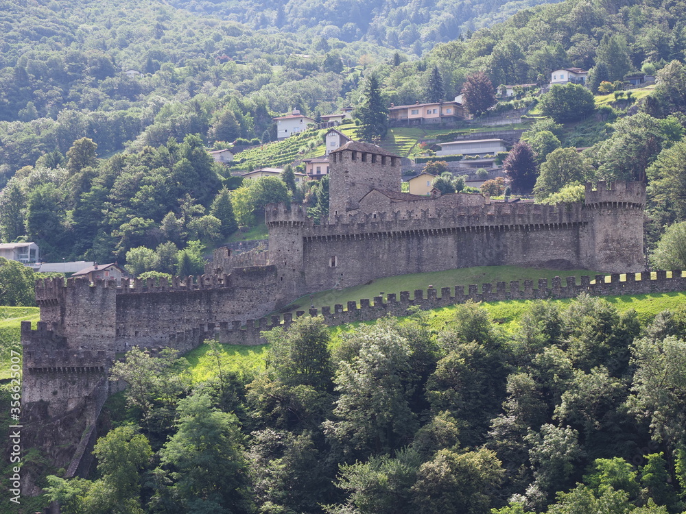 Fortification of Montebello castle in european Bellinzona city, capital of canton Ticino in Switzerland in 2017 warm sunny summer day on July.