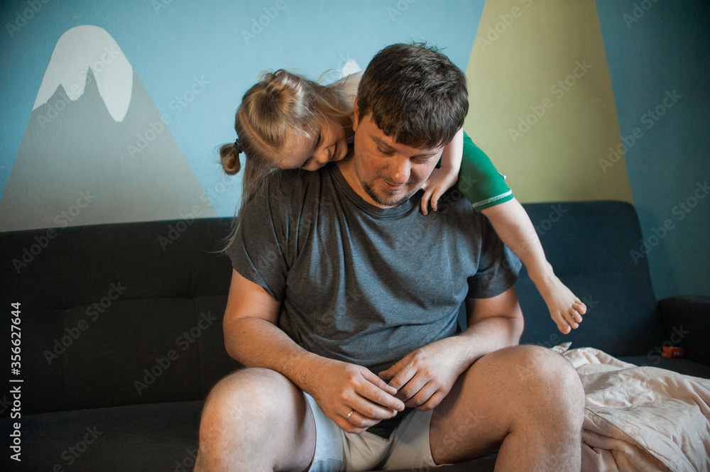 dad plays at home with his children: daughters, son dad plays at home with his children: daughters, son