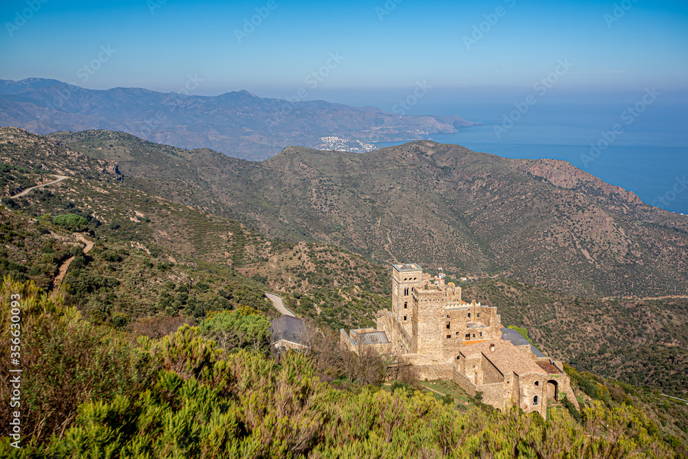 top view of the monastery of Sant Pere de Rodes and mountains