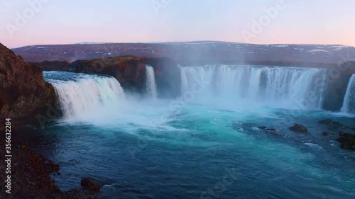 4k drone flight moving to the side footage (Ultra High Definition). Breathtaking sunset on Skjalfandafljot river, Iceland, Europe. Astonishing summer view of Godafoss waterfall. photo