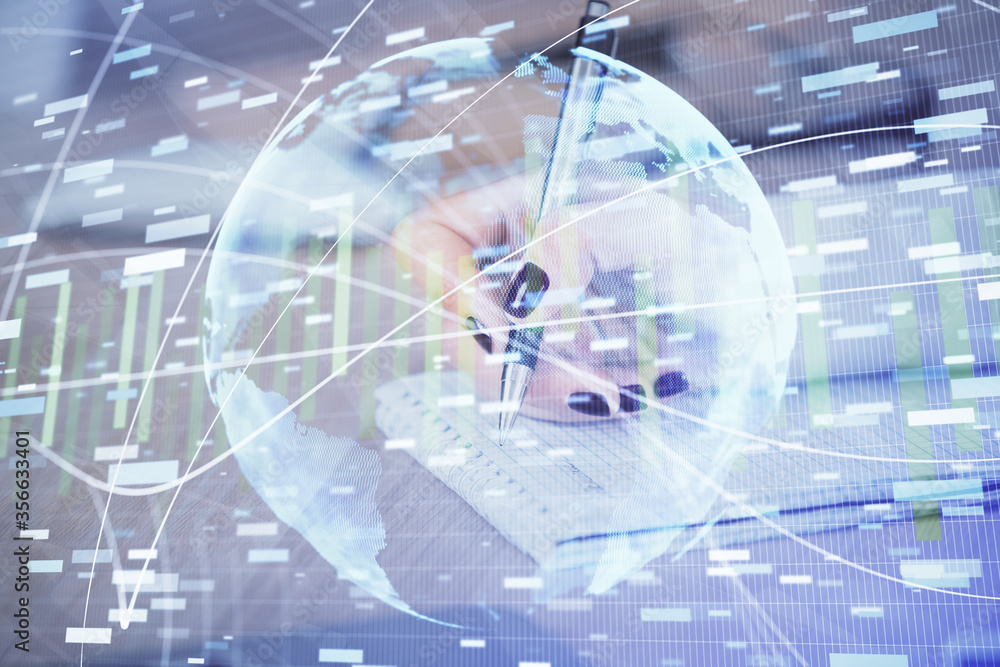 International business hologram over hands taking notes background. Concept of success. Multi exposure International business hologram over hands taking notes background. Concept of success. Multi exposure