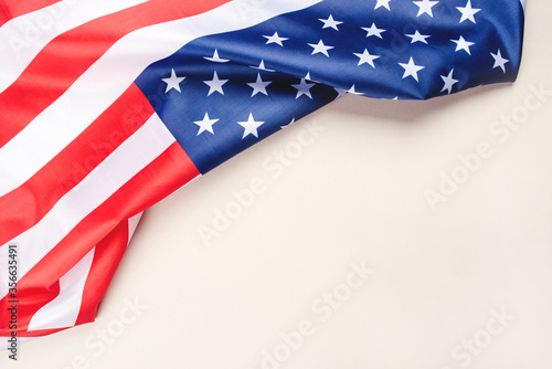 American flag on a gray background. US independence day. Copy space for text.
