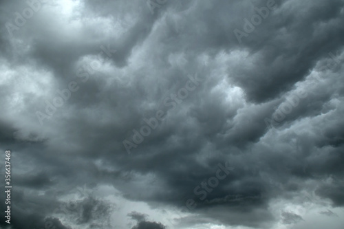 Dramatic dark gray cloudy sky in bad weather condition before storm