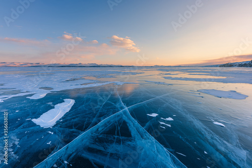 Beautiful crack that goes beyond the horizon on the ice of lake Baikal.