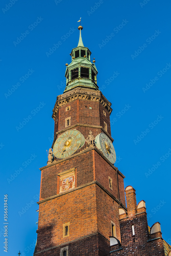 Architectural Details of Town hall tower (Stary Ratusz) on Market square in Wroclaw Old Town. Gothic town hall built from XIII century - one of main landmarks of Wroclaw city. Lower Silesia, Poland.