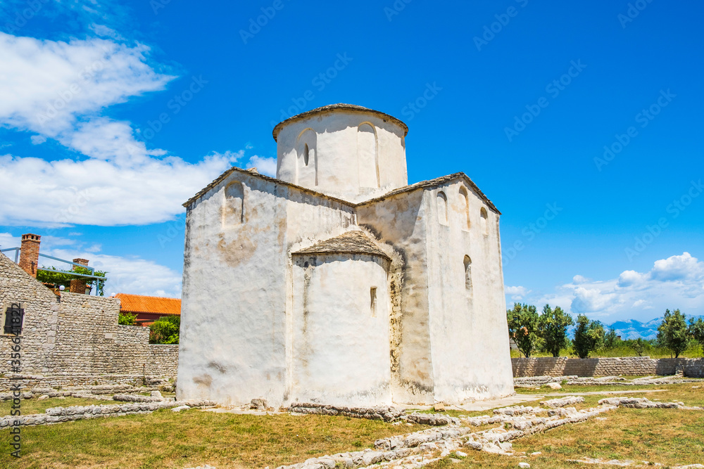Fototapeta premium Croatia, medieval church of Holy Cross and archaeological site in town of Nin in Dalmatia, popular tourist destination