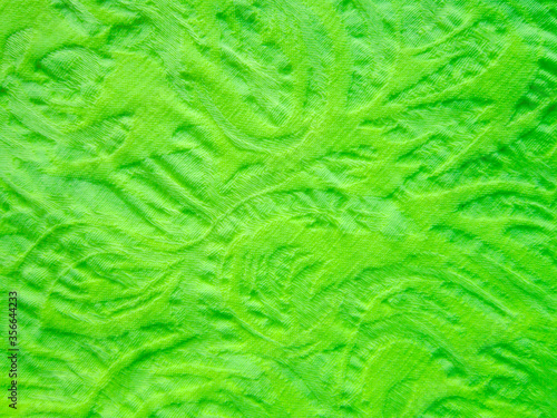 Light green neon jacquard pattern fabric for backgrounds and textures.