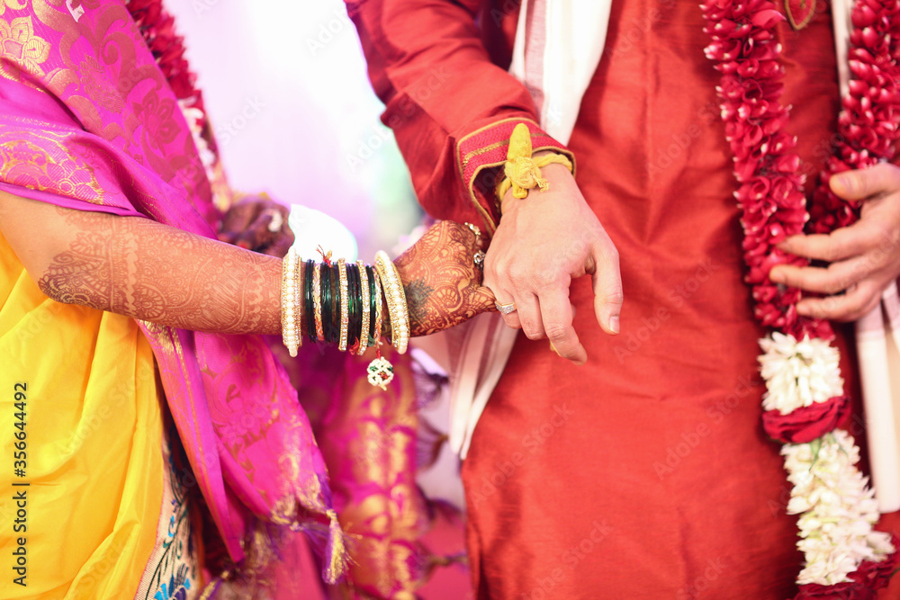 Fototapeta premium In Indian traditional wedding couple holding hand