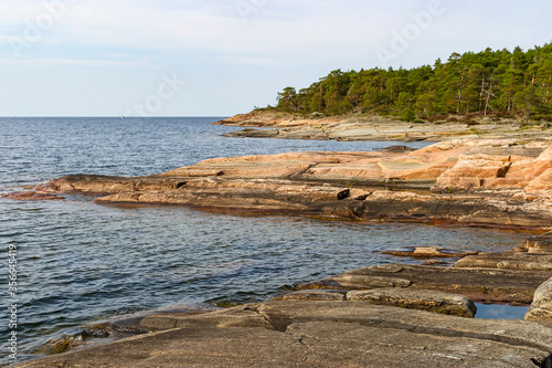Rocky coastline view in a archipelago in the summer photo