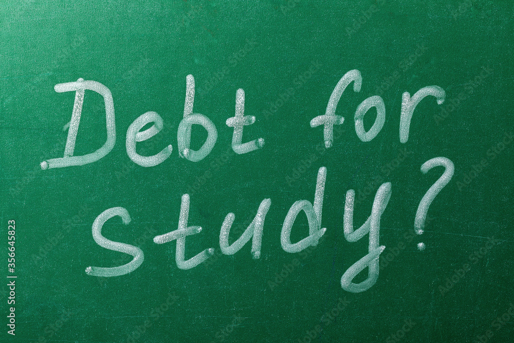 Obraz premium The inscription is chalk on the school board. Concept on Study Debt