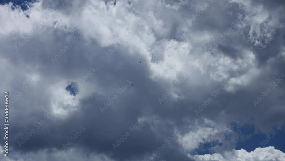 Beautiful White And Grey Clouds Rolling Against The Blue Sky. - timelapse Beautiful White And Grey Clouds Rolling Against The Blue Sky. - timelapse