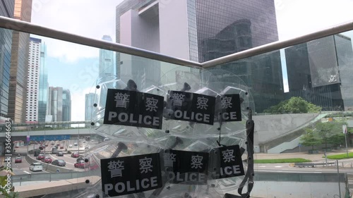 Police shields are seen resting against a glass wall near the Legislative Council in Admiralty, Hong Kong, China on June 03, 2020. photo