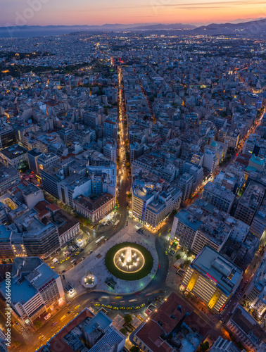 Vertical panorama of Omonia square at Athens city at twilight time, Greece