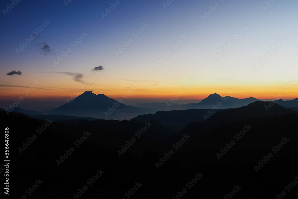 Colourful sunset with view over Guatemalan Volcanos Colourful sunset with view over Guatemalan Volcanos