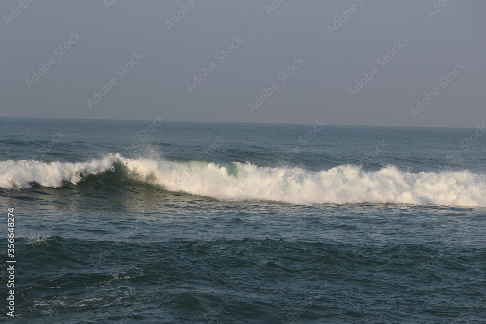 Beautiful Sea waves started to reach the beach of Kanyakumari indian ocean