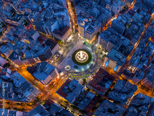 Fototapeta Naklejka Na Ścianę i Meble -  Omonia square at Athens on night twilight time. Aerial view, look down with streets light and traffic