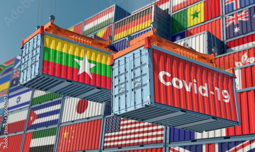 Container with Coronavirus Covid-19 text on the side and container with Myanmar Flag. Concept of international trade spreading the Corona virus. 3D Rendering © Marius Faust