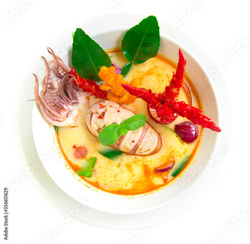 Tom yum pla muek Thaifood spicy soup with squid photo