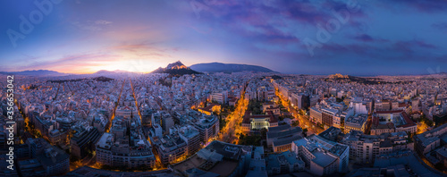 Wide mystical sunrise panorama of Athens, Greece. Horisontal panoramic view of Athens city center