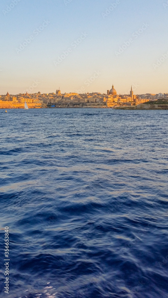 Valletta skyline from the sea at sunset - Malta