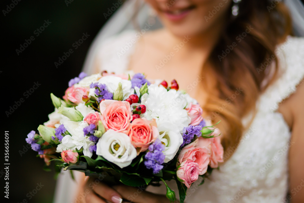 Bouquet of white and red roses for the bride at the wedding