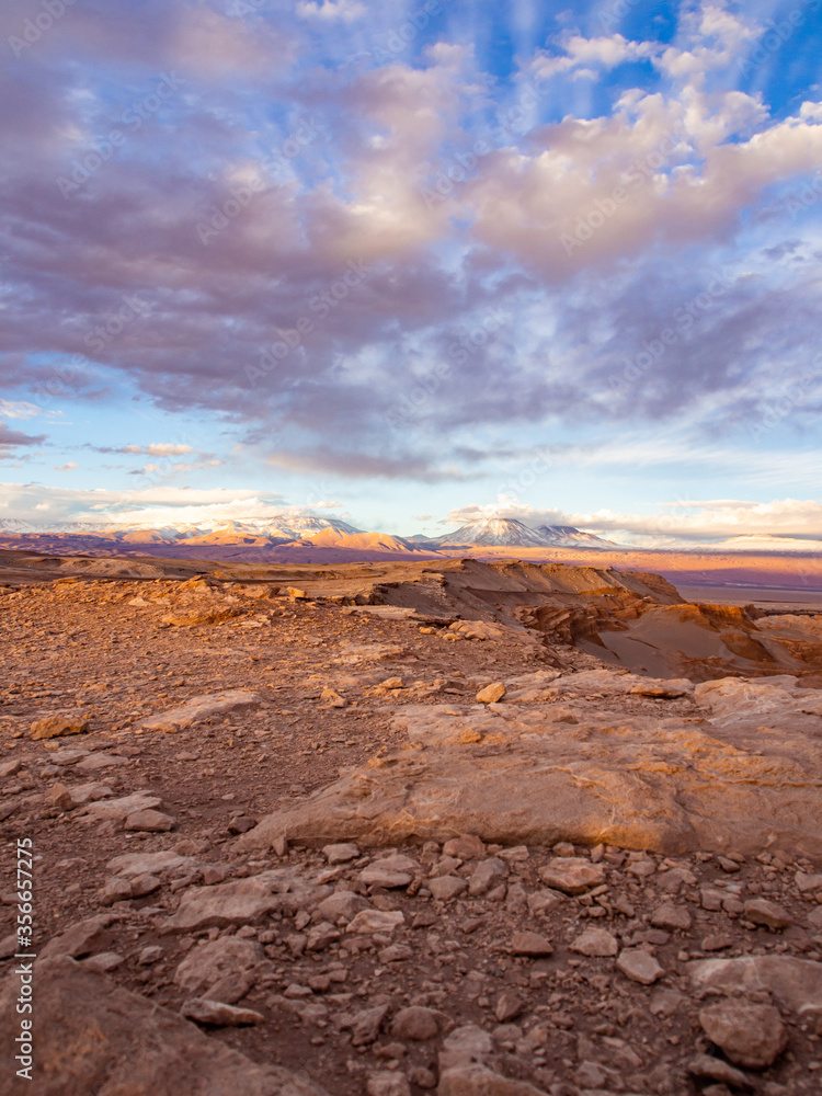 Colourful sunset near Andes Mountains in Mars like landscape at the valley of the Moon (Valle de la Luna) in Chile, South America