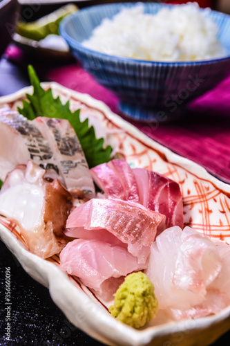 Five Kind Of Sashimi On Plate With A Bowl Of Rice 