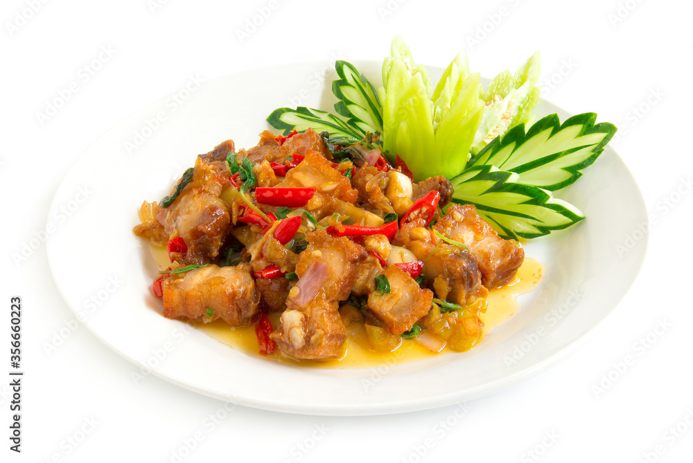 Thai food stir-fried crispy pork spicy and Thai basil served Thai food stir-fried crispy pork spicy and Thai basil served