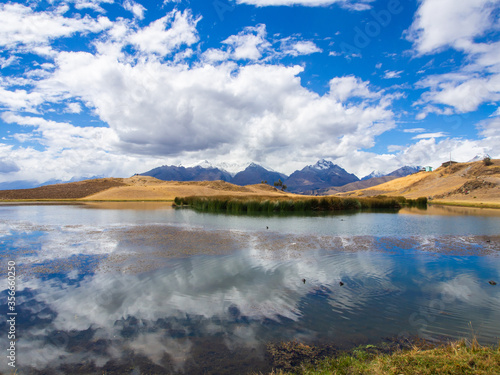 Small lake Laguna Wilcacocha in the andean mountains, Peru  photo