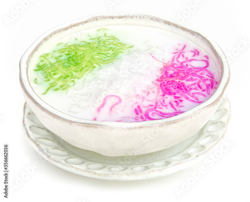 Thai dessert Sweet noodles in coconut milk Syrup (Sarim) side view  isolated on white backgroundThailand side view isolated on white background photo