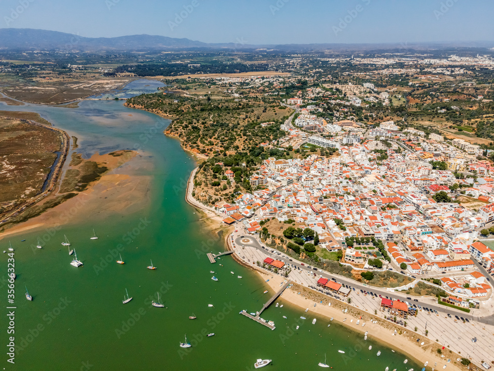 Aerial view of nature and city of Alvor, Algarve, Portugal