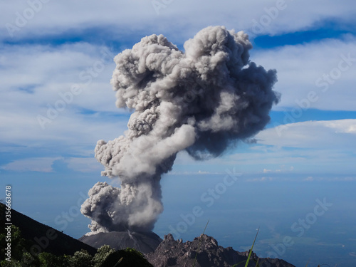 Erupting Volcano Releases Plume Of Ash