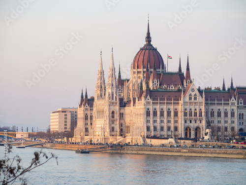 Budapest parliament building at danube river at sunset in spring  © Nino