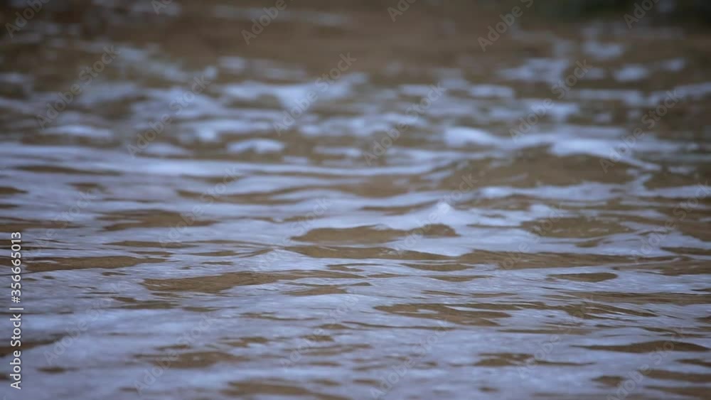 Long shutter video of sea water on the shore Long shutter video of sea water on the shore