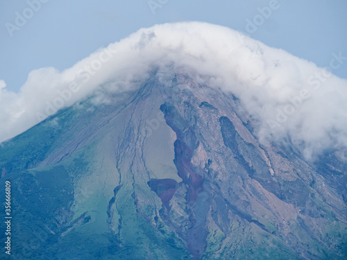 Volcano on Isla de Ometepe, Nicaragua covered in clouds photo