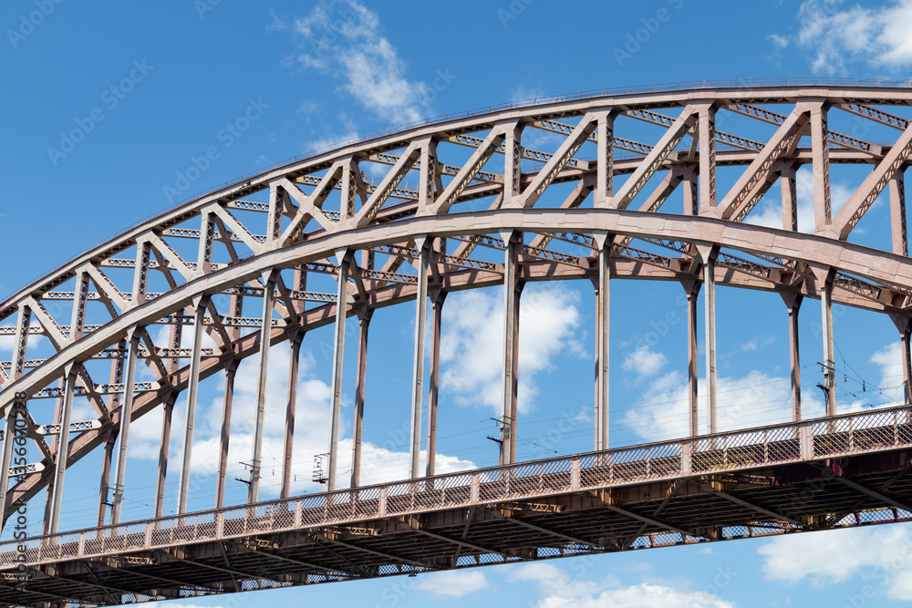 The Hell Gate Railroad Bridge against a Blue Sky in New York City The Hell Gate Railroad Bridge against a Blue Sky in New York City
