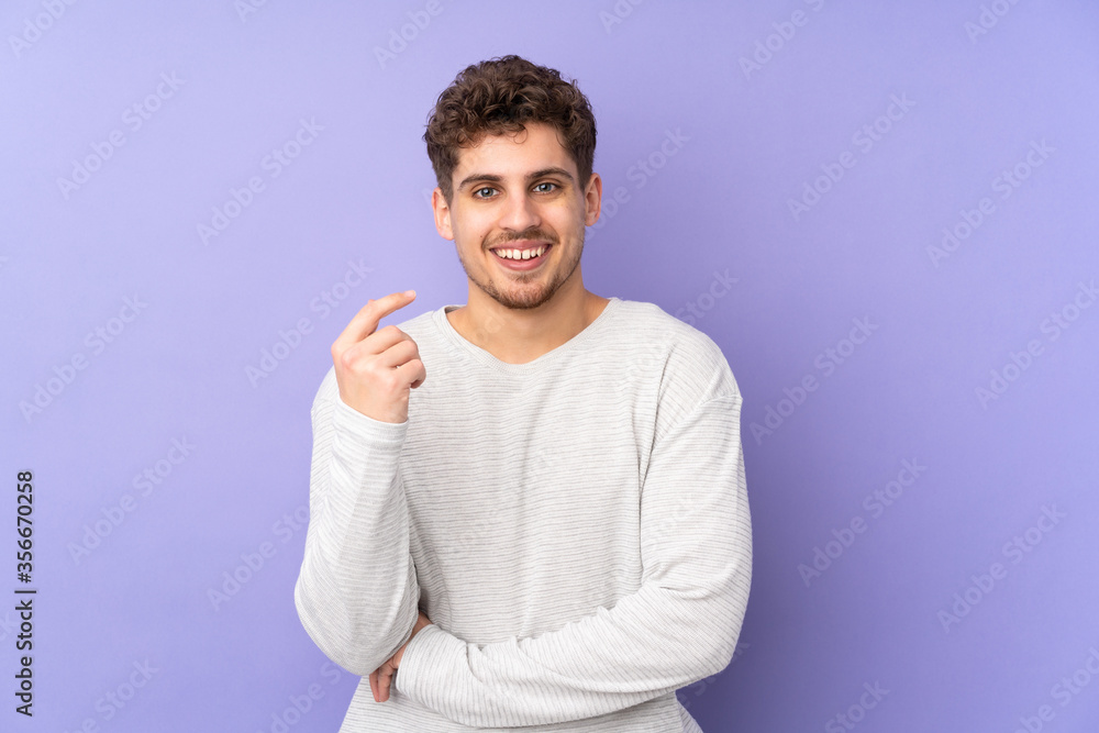 Caucasian man isolated on purple background laughing Caucasian man isolated on purple background laughing