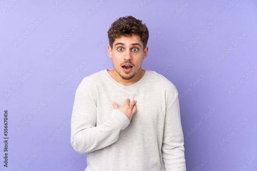 Caucasian man isolated on purple background pointing to oneself Caucasian man isolated on purple background pointing to oneself