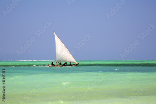Ngalawa sailing in turquoise Zanzibar