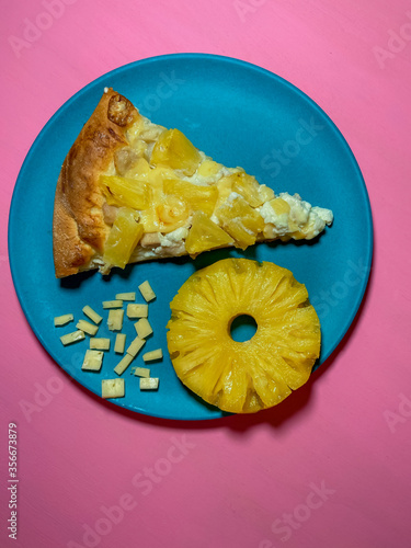 Pizza with pineapple  on a plate