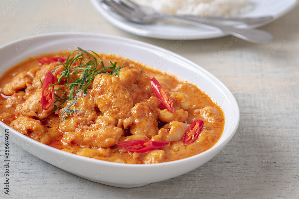 Chicken panang curry served with rice, Thai food Chicken panang curry served with rice, Thai food