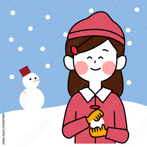 雪だるまの背景と雪で遊ぶ子供