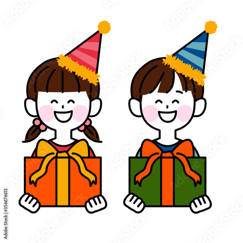 お祝いのプレゼントをもらって喜ぶ子ども