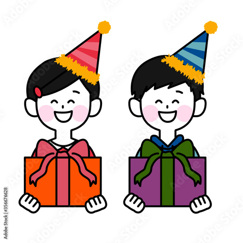 お祝いのプレゼントをもらって喜ぶ子ども