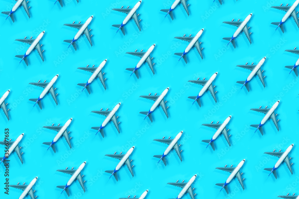 Pattern made of model airplane on blue background. Pattern made of model airplane on blue background.