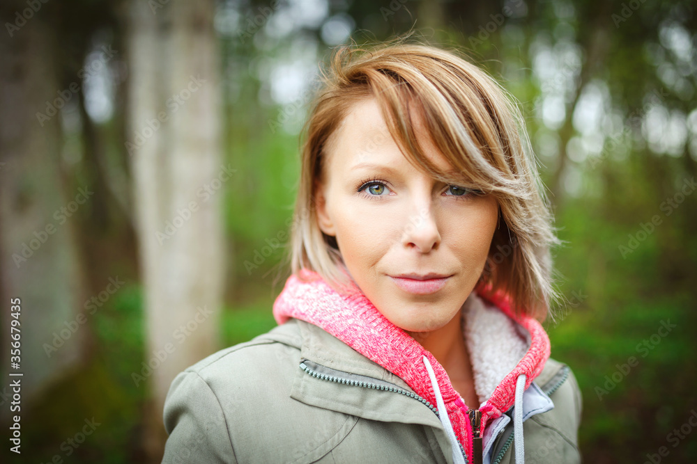 Outdoor portrait of a young cute woman Outdoor portrait of a young cute woman