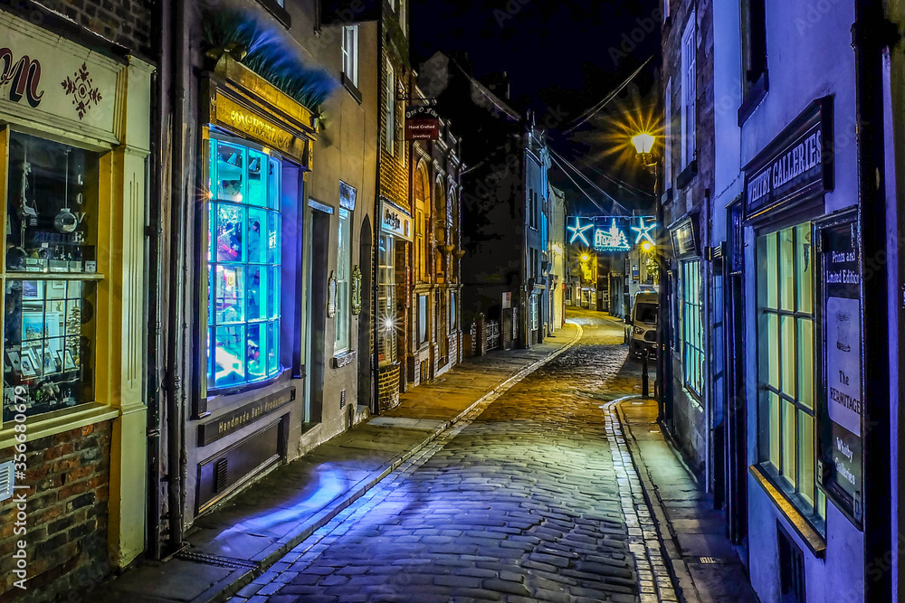 Ancient streets of historical old fishing town Whitby, the home of Dracula on the dramatic North Yorkshire coast, fantastic adventure travel destination or holiday vacation to view picturesque scenery