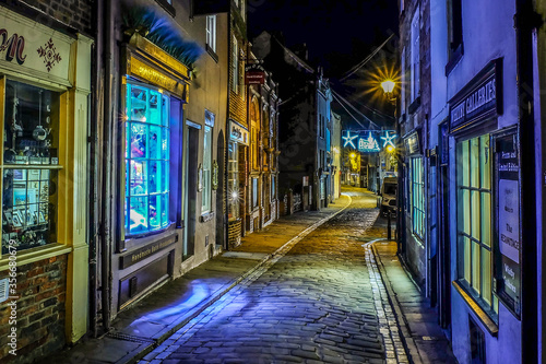 Ancient streets of historical old fishing town Whitby  the home of Dracula on the dramatic North Yorkshire coast  fantastic adventure travel destination or holiday vacation to view picturesque scenery