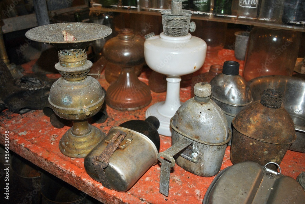 Assortment of antique items including water flasks, oil lamps and more used by soldiers during the World War 11 recovered from all over the island of Rota, Northern Mariana Islands. Assortment of antique items including water flasks, oil lamps and more used by soldiers during the World War 11 recovered from all over the island of Rota, Northern Mariana Islands.