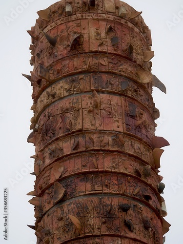 Close up of the details of the Totem Telurico or totem pole at the Quincentennial plaza of the Old San Juan section designed by Puerto Rican artist Jaime Suarez. photo